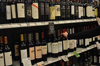 A selection of wine on shelves at Hickey's Wine & Spirits.