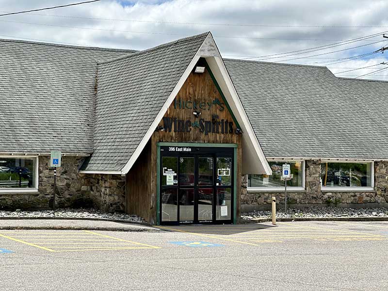 Exterior of Hickey’s Wine & Spirits store and parking lot.