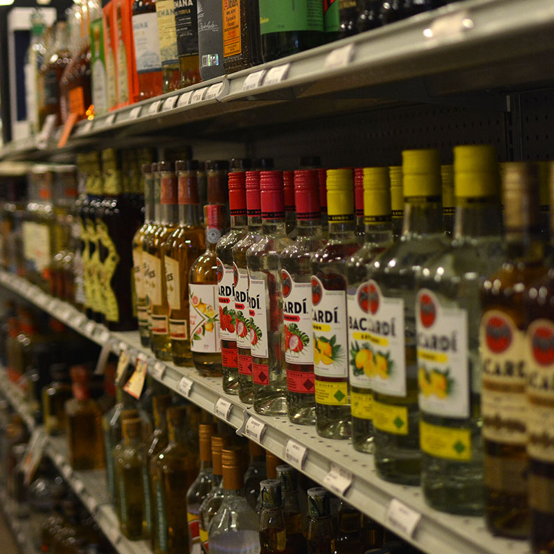 A selection of spirits on shelves at Hickey's Wine & Spirits.