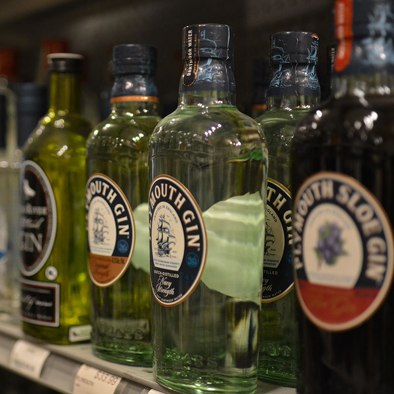 A selection of gin spirits on shelves at Hickey's Wine & Spirits.