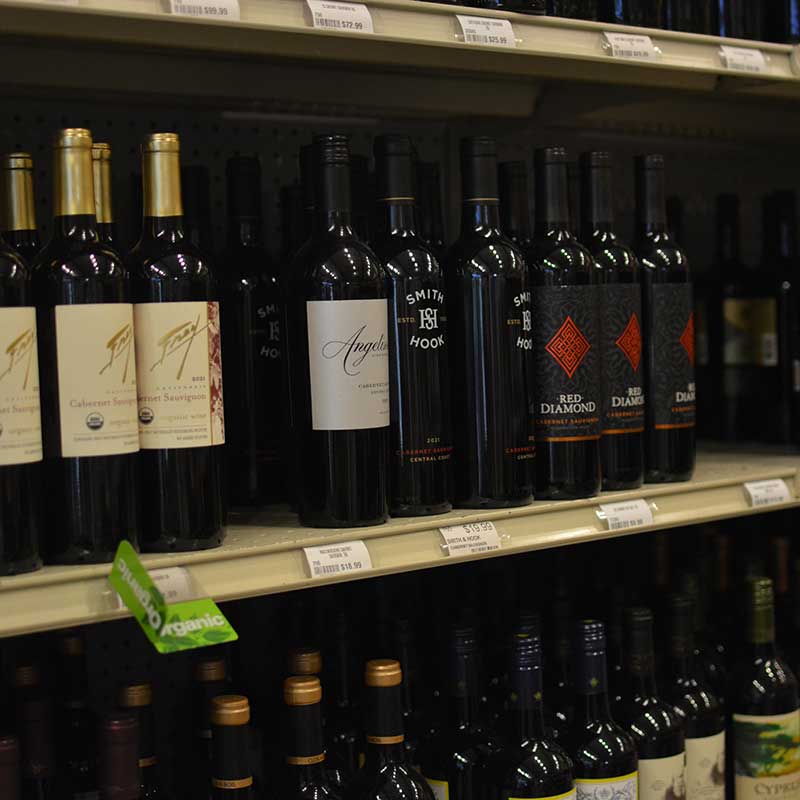 A selection of wine on shelves at Hickey's Wine & Spirits.